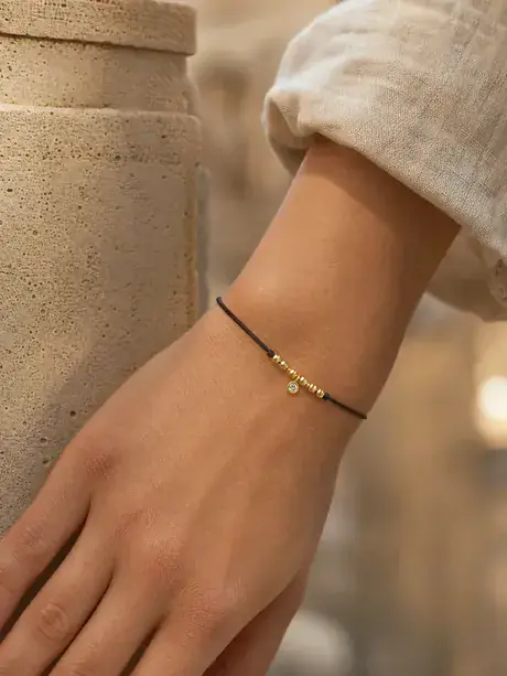 Gold bracelet generated frame
